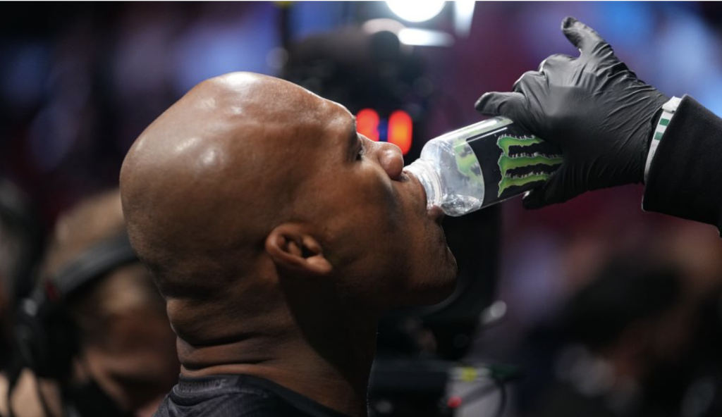 fighter drinking water bottle at ufc london event