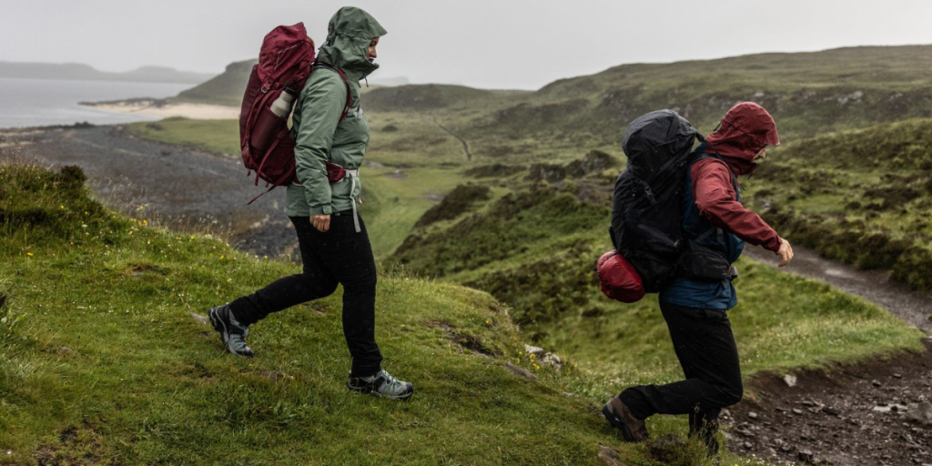 people walking together in the rain