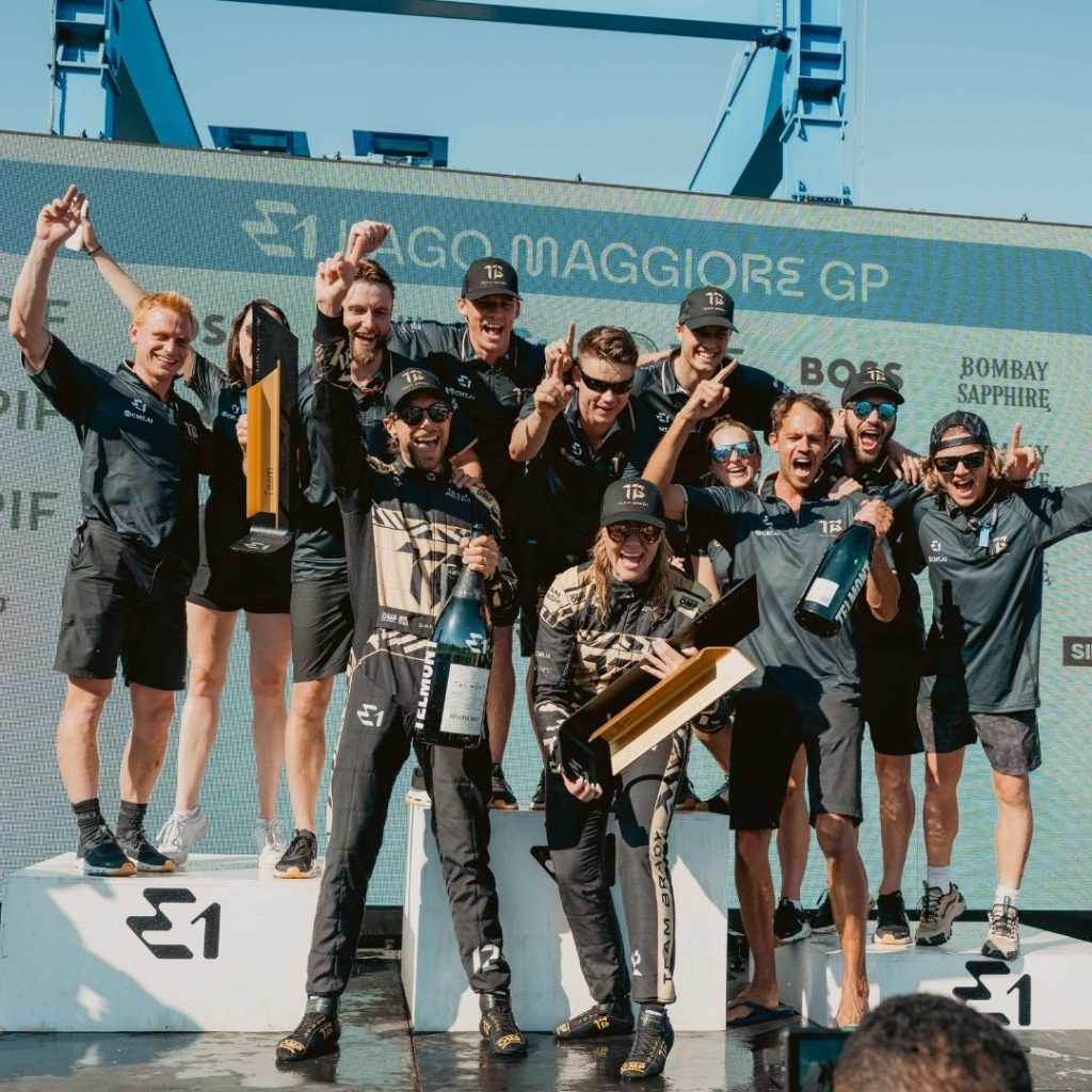 e1 winning team at lake maggiore celebrating